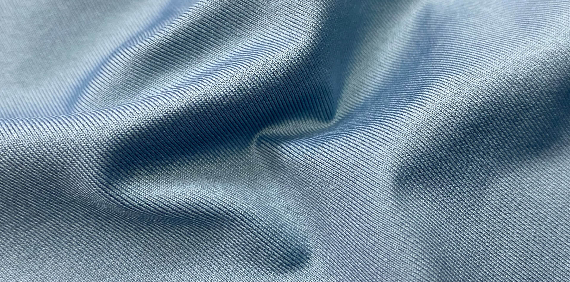Functional Knitted Fabric with Permanent UV Resistance,Cooling Effect,and High Elasticity